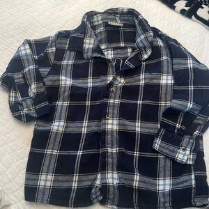 Flannel button down peace sign decal on back